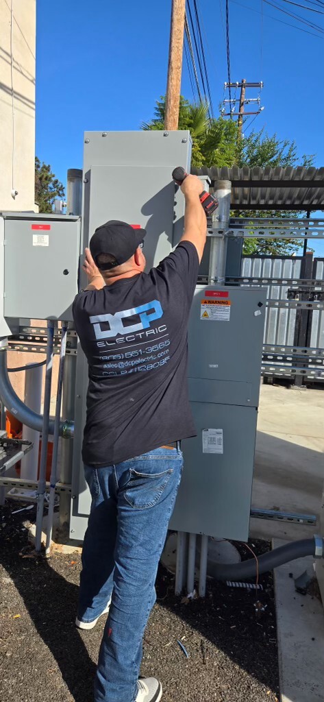 DCP Electric technician installing a commercial electrical panel in Ventura County